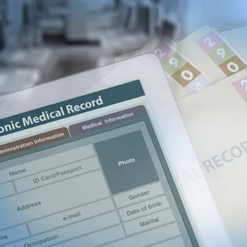 Background photo showing medical record changing from paperwork to electronic medical record.
